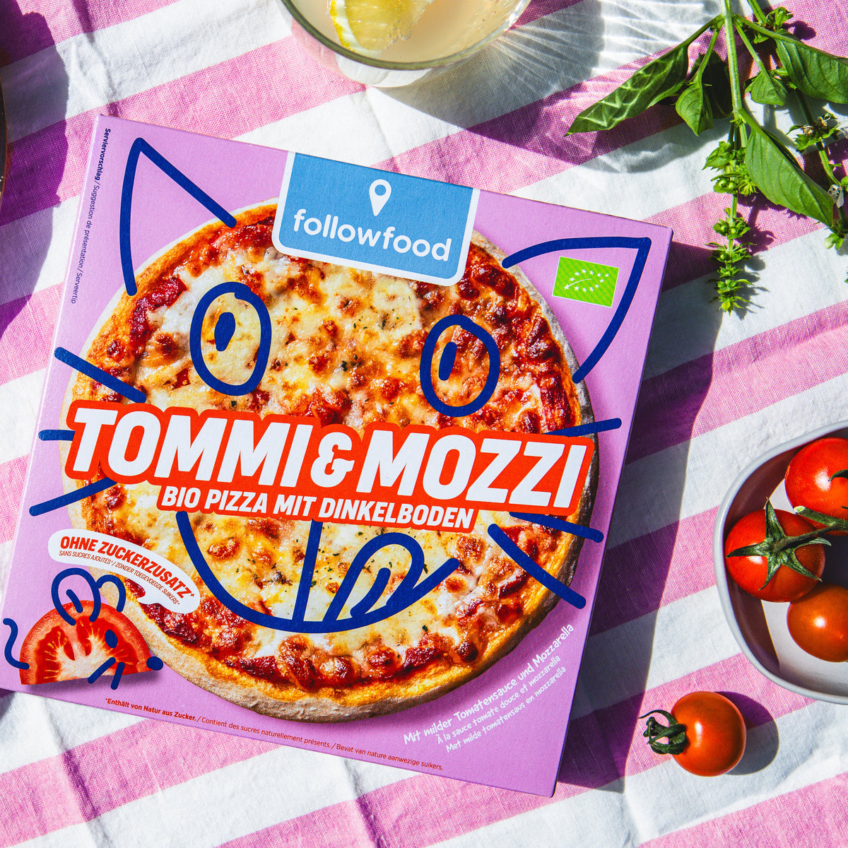 followfood Bio Pizza Tommi & Mozzi Verpackung auf Picknicktisch